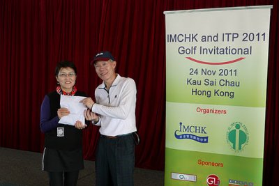 Alfred Presenting Prize to the Lady Winner.jpg