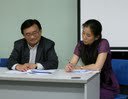Chairman Mr Fred Kwan sharing his view with Hon Secretary Angela Lee.JPG