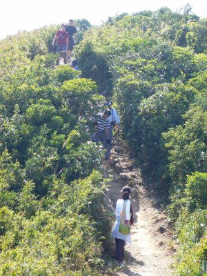 Members walking on the ridge of Dragon Back.jpg