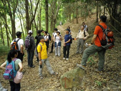 Sunny explaining afforestation to Group.JPG