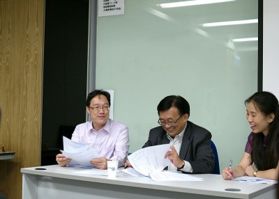 The head table attended to an exciting matter.JPG