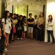 staff of Hung Fook Tong explaining the benefits of herbal drink
