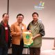 Presentation of souvenir to Wetland Park staff s